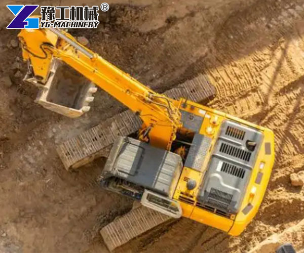 Compact excavator with specialized rock bucket