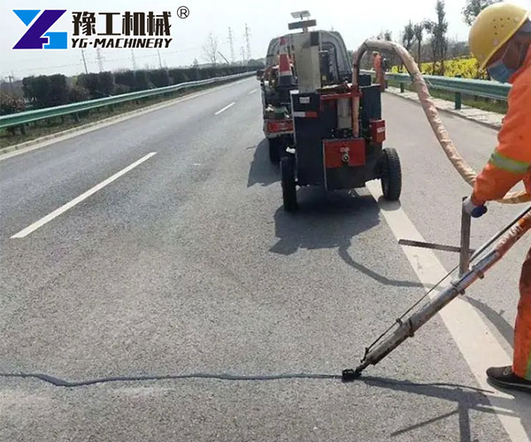 Highway crack sealing in progress