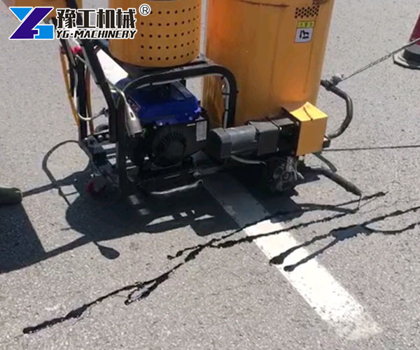Operating a crack filler machine on highway
