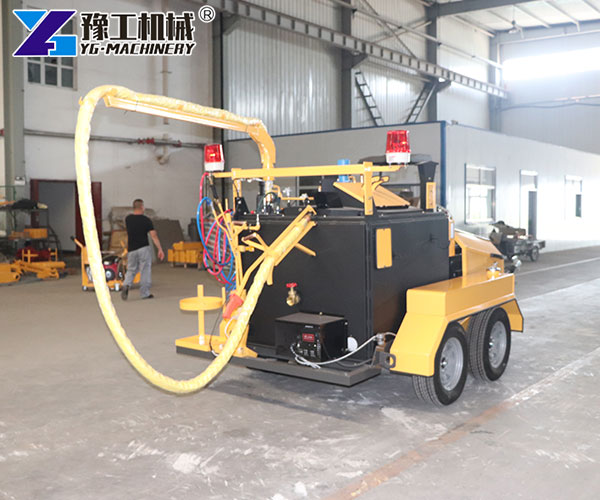 Sealed asphalt road with crack sealer machine