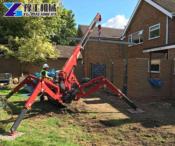 Compact Spider Crane Working In Narrow Alley
