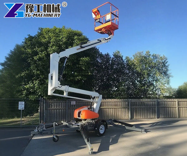Electric trailer cherry picker extended upward