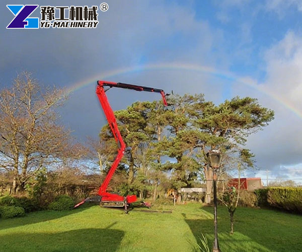 Spider cherry picker lifting worker for tree cutting