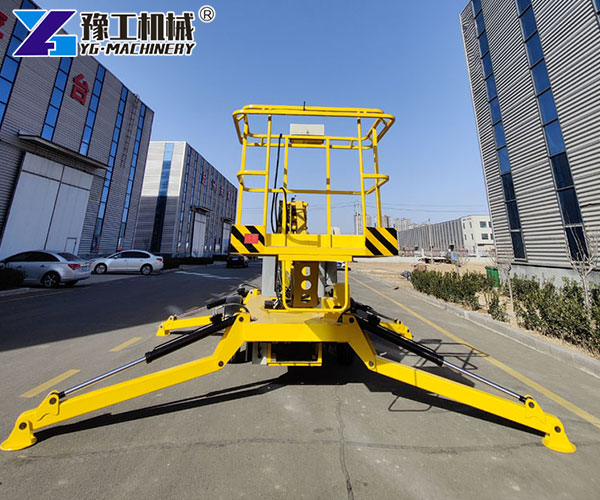 Articulating aerial lift trimming tall trees