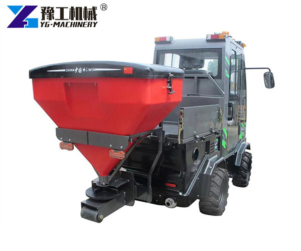 Salt spreader attachment for snow clearing machine