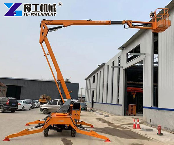 Towable boom lift working on construction site