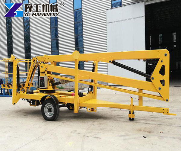 Trailer mounted articulating boom lift outdoors