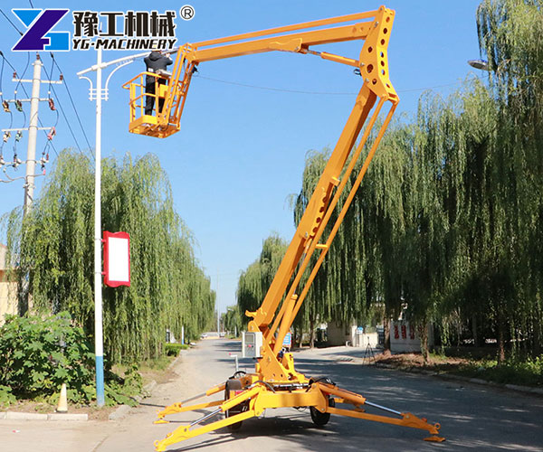 Worker using trailer boom lift safely