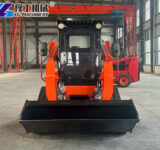 mini track skid steer working on site