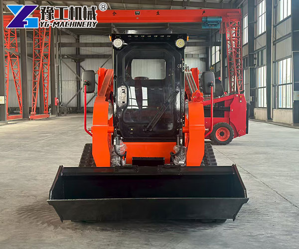 mini track skid steer working on site