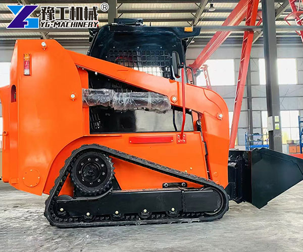 operator driving a compact skid steer loader