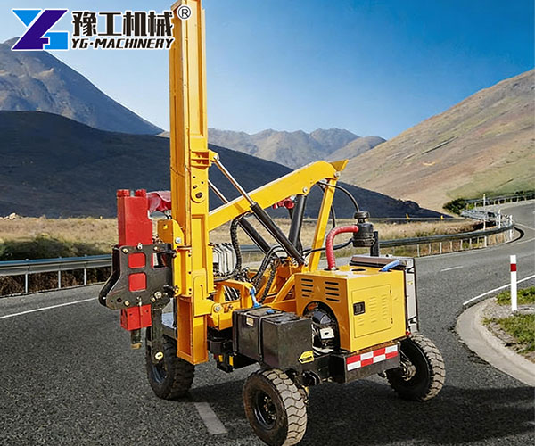 Road safety barrier post driver equipment