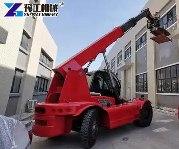 Telescopic boom forklift loading construction materials