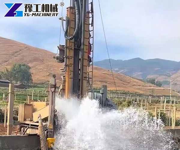 Crawler water well drilling rig site
